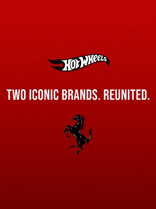 Hot Wheels and Ferrari logos on red with the words Two iconic brands. Reunited.