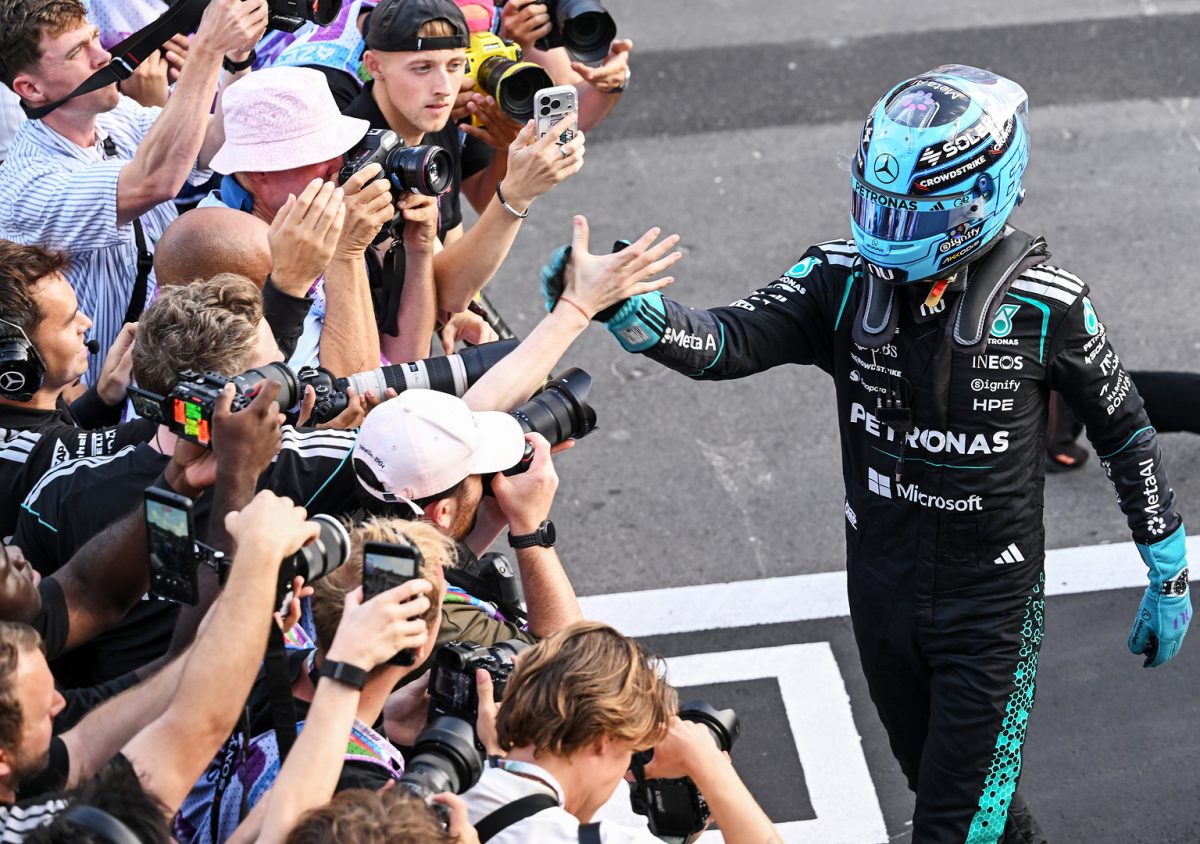 George Russell celebrating pole position in parc ferme at the Baku City Circuit