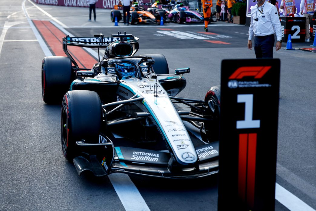 George Russell's Mercedes parked behind the pole position board after qualifying in Baku