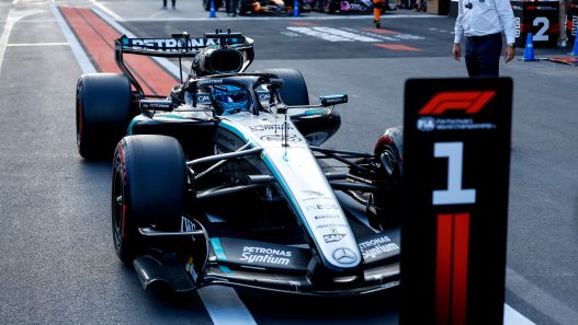 George Russell's Mercedes parked behind the pole position board after qualifying in Baku