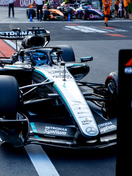 George Russell's Mercedes parked behind the pole position board after qualifying in Baku