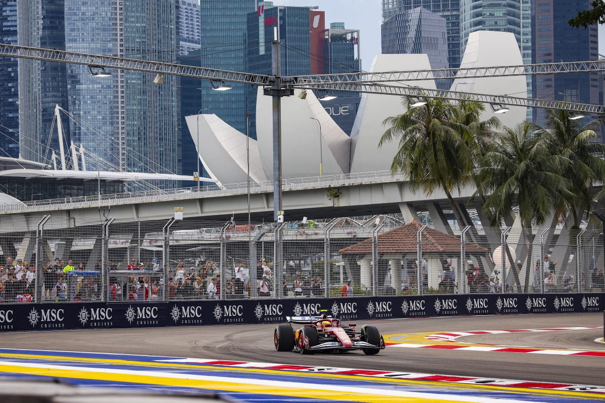 Lewis Hamilton’s Ferrari passing the ArtScience Museum at the Marina Bay Street Circuit