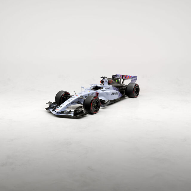 The Audi car in its Singapore livery on a white studio floor