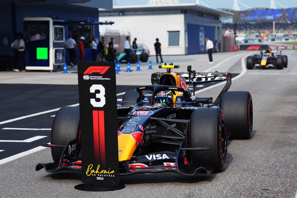 Isack Hadjar arriving in parc ferme behind the P3 board in his Red Bull