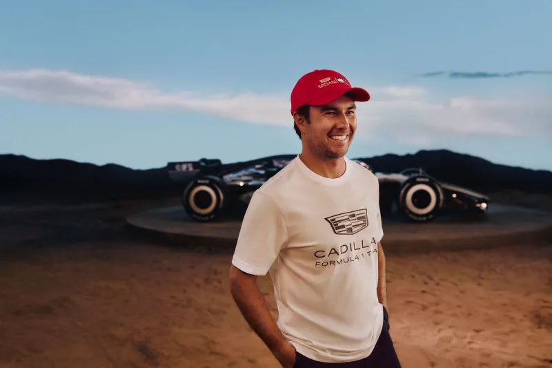 Sergio Pérez wearing the co-branded Tommy Hilfiger x Cadillac F1 collection